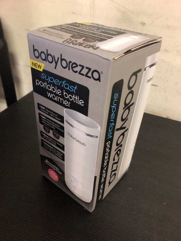 Photo 1 of Baby Brezza Superfast Portable Baby Bottle Warmer – 67% Faster - Travel Breastmilk Warmer and Formula Warmer - Safe, Even Heating - Up to 9oz - No Adapters, White