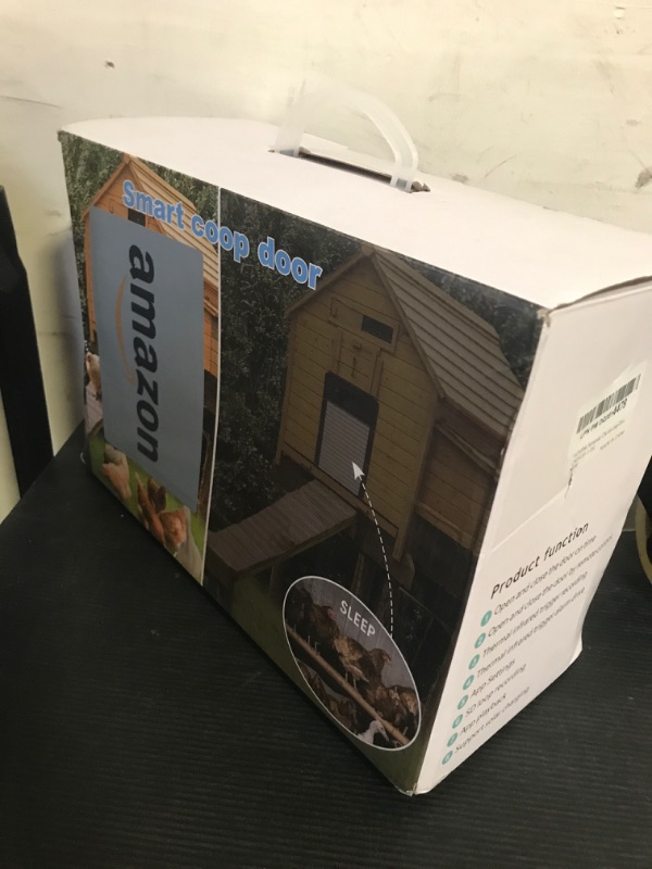 Photo 1 of Automatic Chicken Coop Door with WiFi and HD Camera, Remote APP Monitoring, Anti-Trap Sensor and Alarm Actuator, with Large Solar Power and 5000 mAh Battery, Anti-Trap Protection (Black)