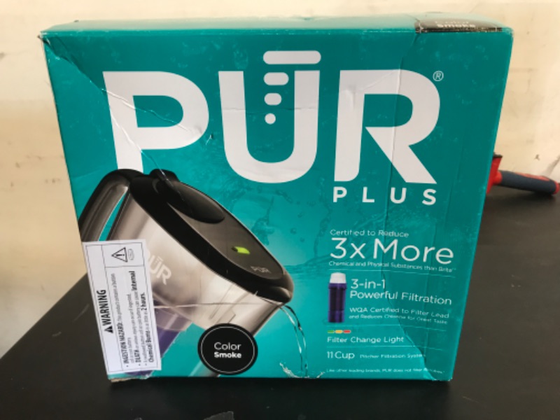 Photo 1 of PUR Plus 11-Cup Water Pitcher, 1 Lead-Reducing Filter, Cleaner, Great-tasting Water, Dishwasher Safe, Powerful Filtration, Filter Change Light Indicator, LockFit Cap Design - Smoke
