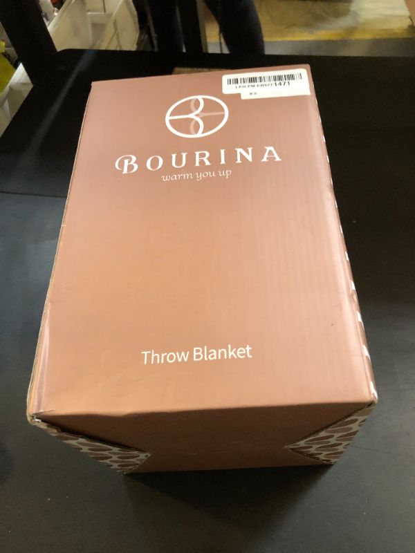Photo 1 of BOURINA Orange Throw Blanket 50 x90 Inches Throw Textured Solid Soft Sofa Throw Bed Runner Couch Cover Knitted Decorative Blanket Bed Runner