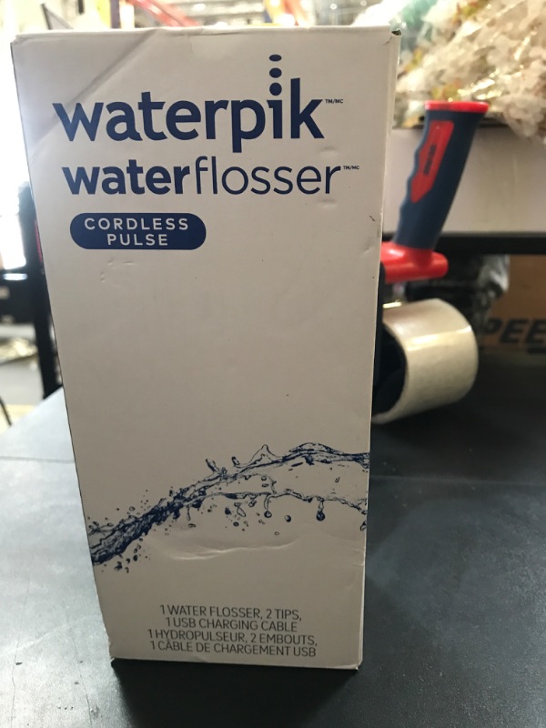 Photo 1 of Waterpik Cordless Pulse Rechargeable Portable Water Flosser for Teeth, Gums, Braces Care and Travel with 2 Flossing Tips, Waterproof, ADA Accepted, WF-20 White, Packaging May Vary