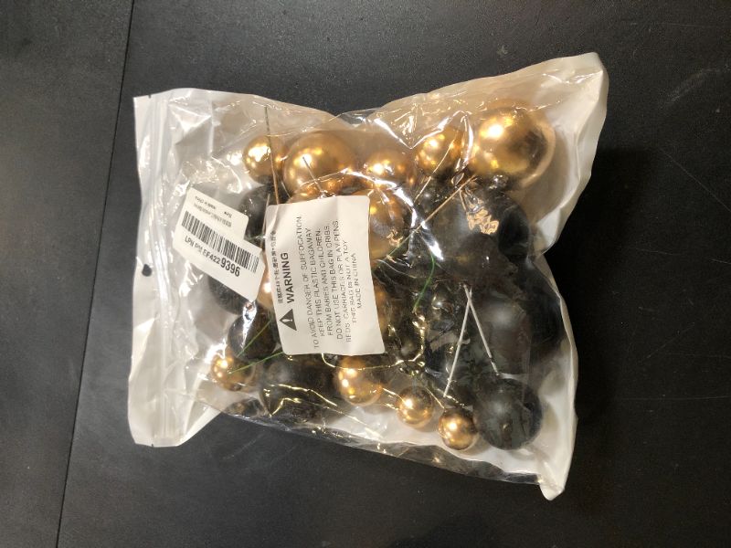 Photo 1 of BEISHIDA 40 Pcs Ball Cake Toppers Mini Balls Cake Decorations Black Gold Foam Balls Sticks DIY Cake Topper for Baking Congrats Grade 2025 Graduation Birthday Retirement Party Decorations (Black Gold)
