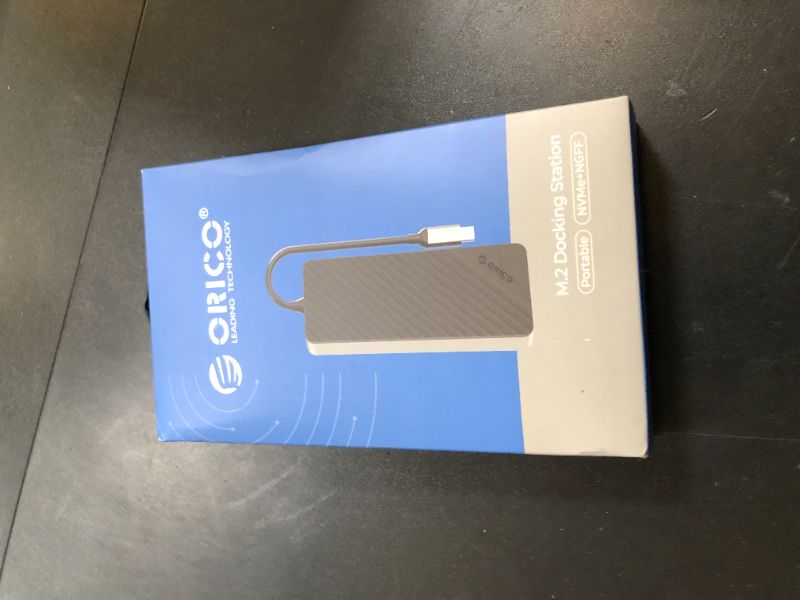 Photo 1 of ORICO USB-C Hub with M.2 SSD Enclosure, 8-in-1 USB C Docking Station Fits M.2 NVMe/SATA SSD, 10Gbps, 4K@60Hz HDMI, 100W PD, SD/TF Card Reader - OM28P