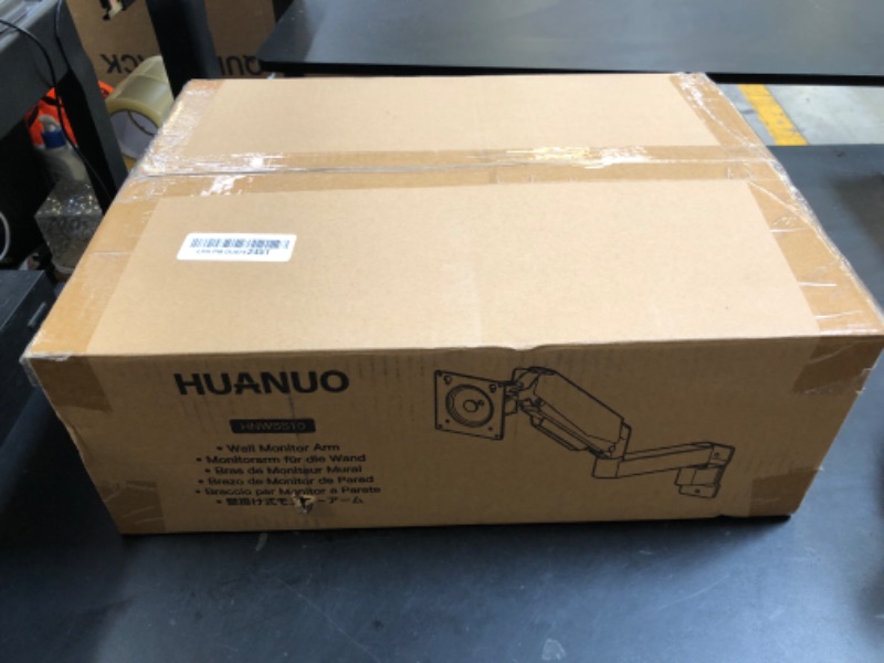 Photo 1 of HUANUO 49 inch Ultrawide Monitor Wall Mount, Heavy Duty Screen Arm with Premium Aluminum, Supports up to 44 lbs, Gas Spring Wall Mount Monitor Arm for Height Adjustment, Tilt, Swivel, Rotate