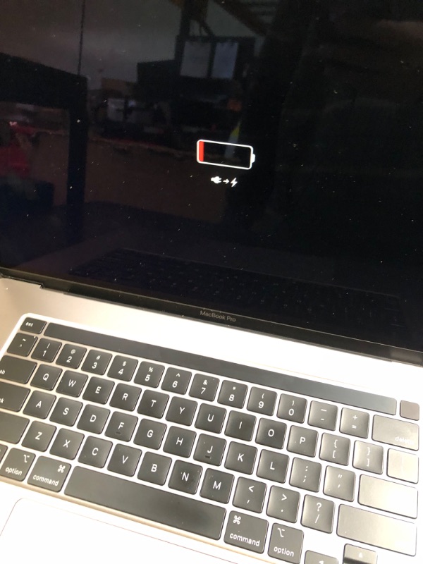 Photo 1 of Apple MacBook Pro Late 2019 with 2.6GHz Intel Core i7 (16 inch, 16GB RAM, 512GB) Space Gray (Renewed)