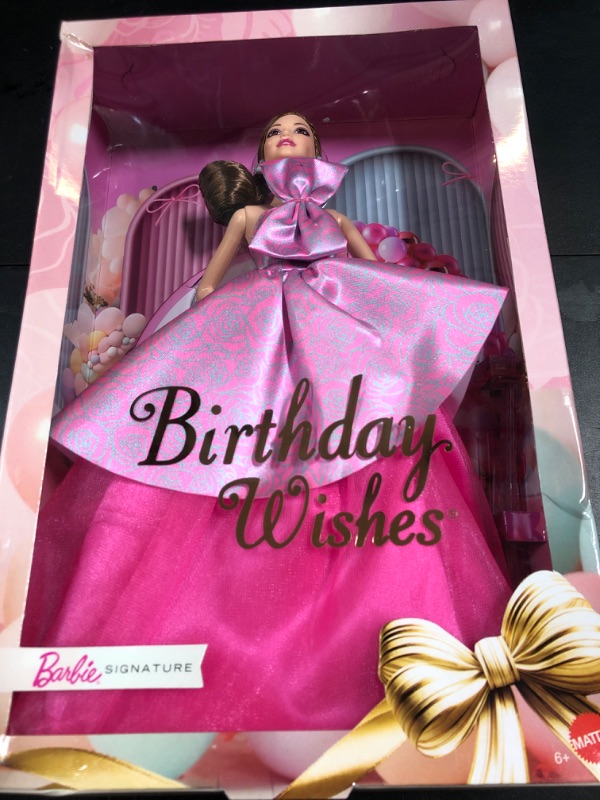 Photo 1 of Barbie Signature Birthday Wishes Doll, Collectible Fashion Doll in Satiny, Pink Dress with Wavy Brown Hair and Giftable Packaging