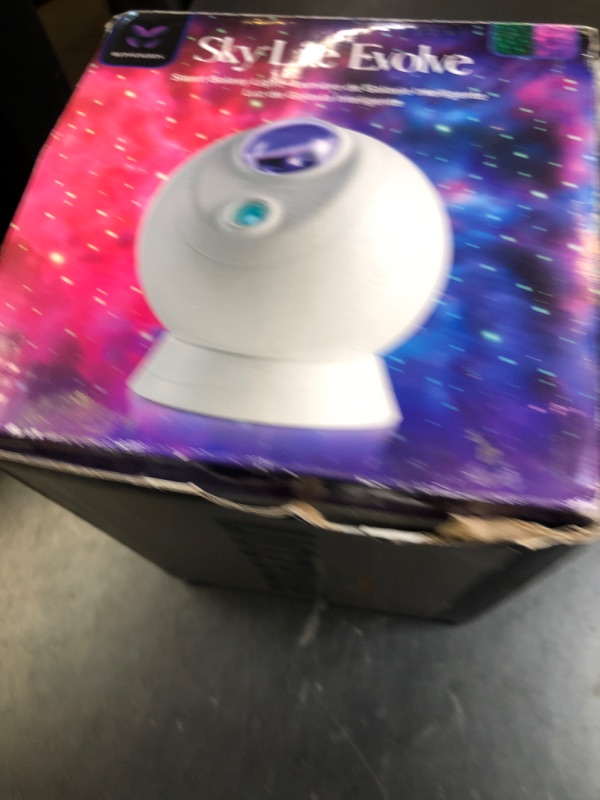 Photo 1 of BlissLights Sky Lite Evolve - Star Projector, Galaxy Projector, LED Nebula Lighting, WiFi App, for Meditation, Relaxation, Gaming Room, Home Theater, and Bedroom Night Light Gift (Green Stars)