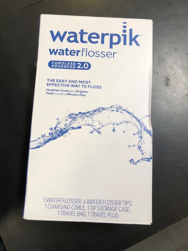 Photo 1 of Waterpik Cordless Advanced 2.0 Water Flosser For Teeth, Gums, Braces, Dental Care With Travel Bag and 4 Tips, ADA Accepted, Rechargeable, Portable, and Waterproof, Blue WP-583, Packaging May Vary