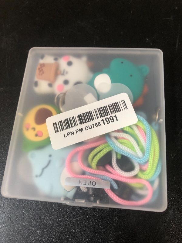 Photo 1 of Air tag Necklace with Adjustable Length, Cute Cartoon Airtags 4 Pack Holder Soft Silicone Skin-Friendly Apple Airtags Case for Kids with Key Ring, Screen Protector