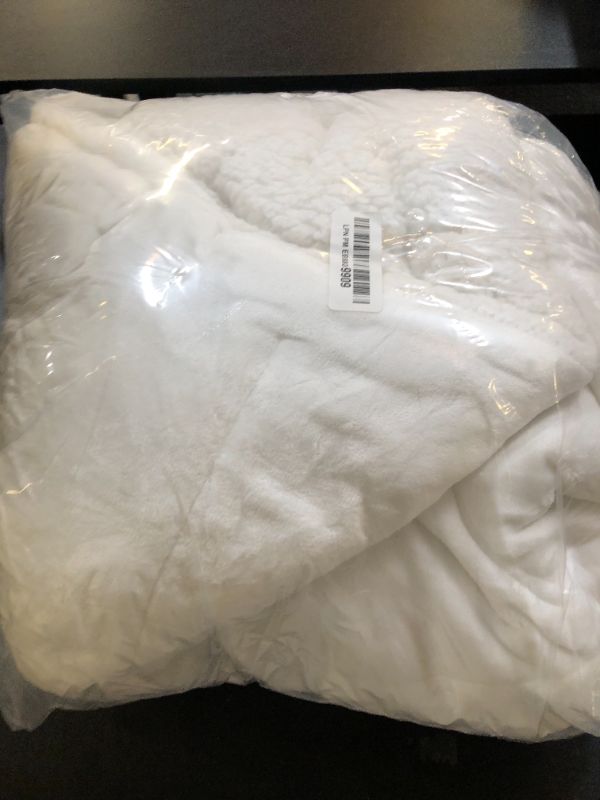 Photo 1 of UGG Nita Throw Blanket Soft Reversible Plush Throw for Couch or Bed Cozy Fuzzy Warm Fluffy Blanket for Living Room or Cute Bedroom Decor Down Alternative Washable, 50-inch x 70-inch, White Snow
