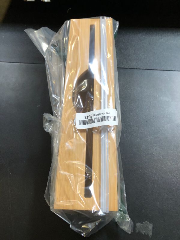 Photo 1 of Plastic Wrap Dispenser with Cutter - Fits 12" Rolls - Cuts Plastic Wrap, Saran Wrap, Cling Wrap, Aluminum Foil, Wax Paper