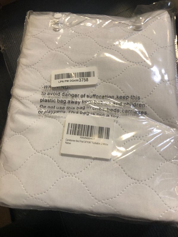Photo 1 of Careboree 2 Pack Cotton Top-Layer Reusable Tuckable Underpads Incontinence Bed Pads 34"X36" Twin Size 21" Wings