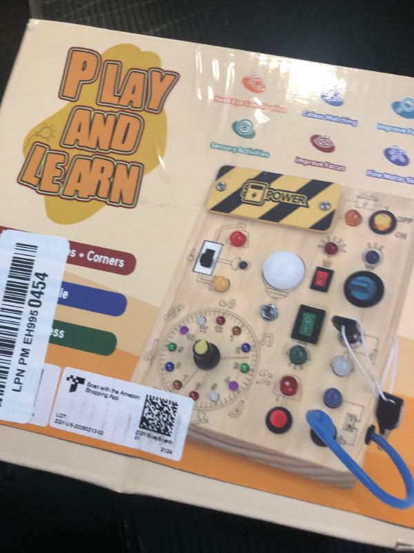 Photo 1 of Iabedi Busy Board, Montessori Toy for 1-3 Years Old, Wooden Toddler Sensory Travel Toy, Ideal Gift for 1+ Year Old Boys (Busy Board Plus V2), Medium, Yellow