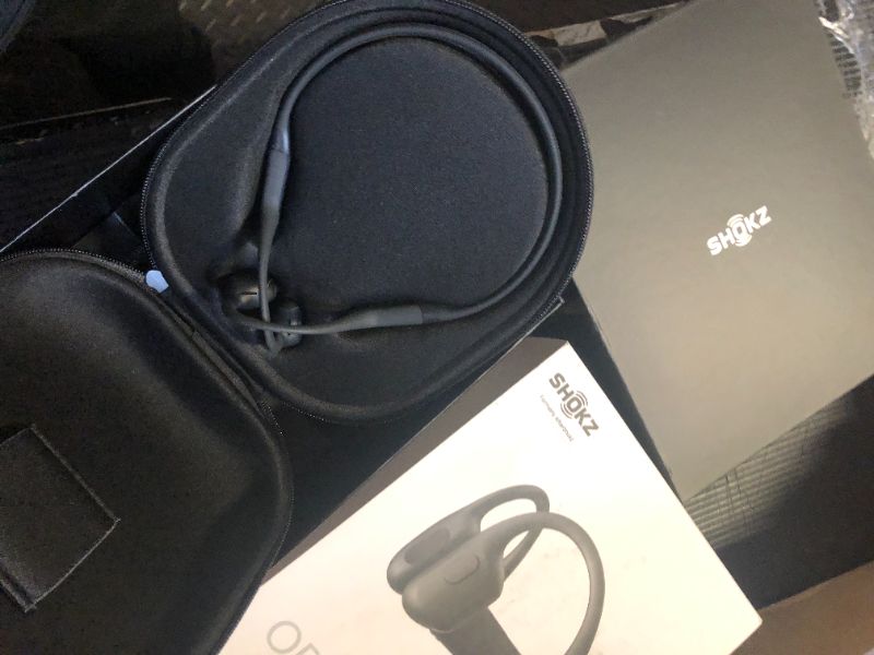 Photo 1 of SHOKZ OpenRun Pro - Open-Ear Bluetooth Bone Conduction Sport Headphones, Sweat Resistant Wireless Earphones for Workouts and Running with Premium Deep Base - Built-in Mic, with Hair Band, Black