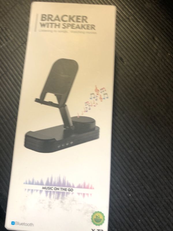 Photo 1 of LBSC Christmas Tech Gift for Men, Cell Phone Stand with Wireless Bluetooth Speaker and Anti-Slip Base HD Surround Sound Perfect for Home and Outdoors with Bluetooth Speaker for Desk Compatible