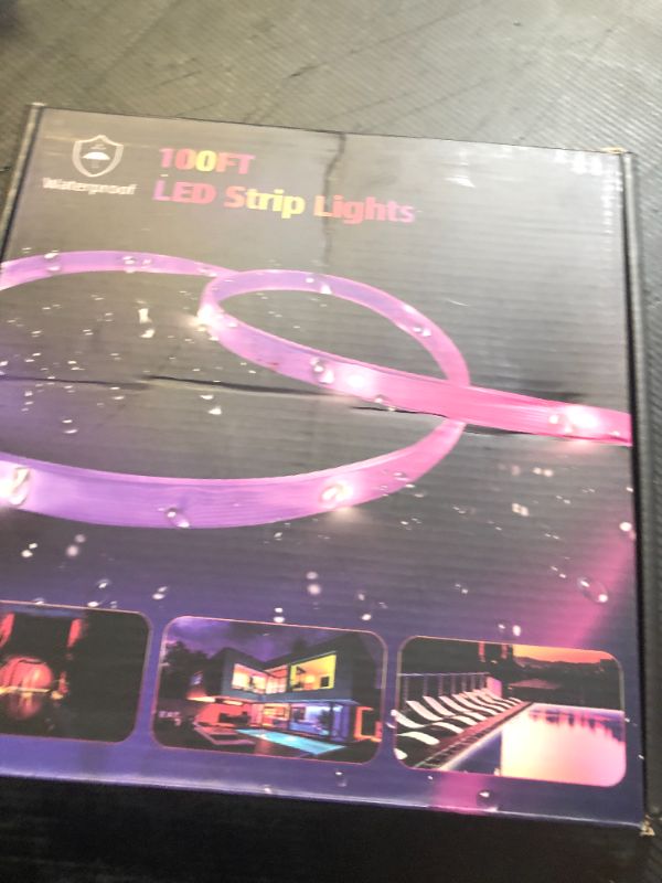 Photo 1 of 100 FT outdoor LED strip lights (2 rolls of 50 FT), IP65 waterproof, music synchronization RGB LED light, with 44 key remote control and application, used for outdoor, balcony, and roof decoration