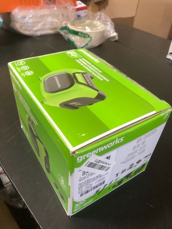 Photo 1 of Greenworks 24V Bluetooth Compact Speaker, AC/DC Wireless Portable Worksite Speaker, 2Ah Battery and Charger Included