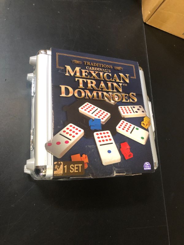 Photo 1 of Spin Master Games, Mexican Train Dominoes Set in Aluminum Carry Case, Includes Colorful Trains for Fun-Filled Family Game Night, for Kids & Family, 2-8 Players, for Ages 8 & Up