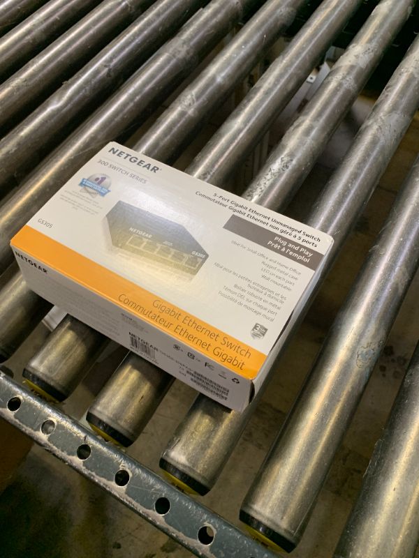 Photo 1 of NETGEAR 5-Port Gigabit Ethernet Unmanaged Essentials Switch (GS305) - Home Network Hub, Office Ethernet Splitter, Plug-and-Play, Silent Operation, Desktop or Wall Mount