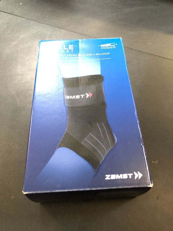 Photo 1 of Zamst A1 Black Ankle Brace for Sports - Breathable Sports Ankle Support for Men and Women with Adjustable Three Way Straps for Moderate Lateral Ankle Sprain - Right, Large