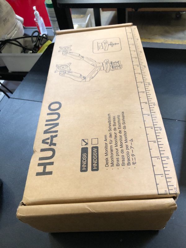 Photo 1 of HUANUO Dual Monitor Stand - Full Adjustable Monitor Desk Mount Swivel Vesa Bracket with C Clamp, Grommet Mounting Base for 13 to 32 Inch Computer Screens - Each Arm Holds 4.4 to 19.8lbs