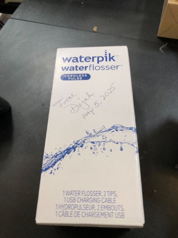 Photo 1 of Waterpik Cordless Pulse Rechargeable Portable Water Flosser for Teeth, Gums, Braces Care and Travel with 2 Flossing Tips, Waterproof, ADA Accepted, WF-20 Gray, Packaging May Vary
