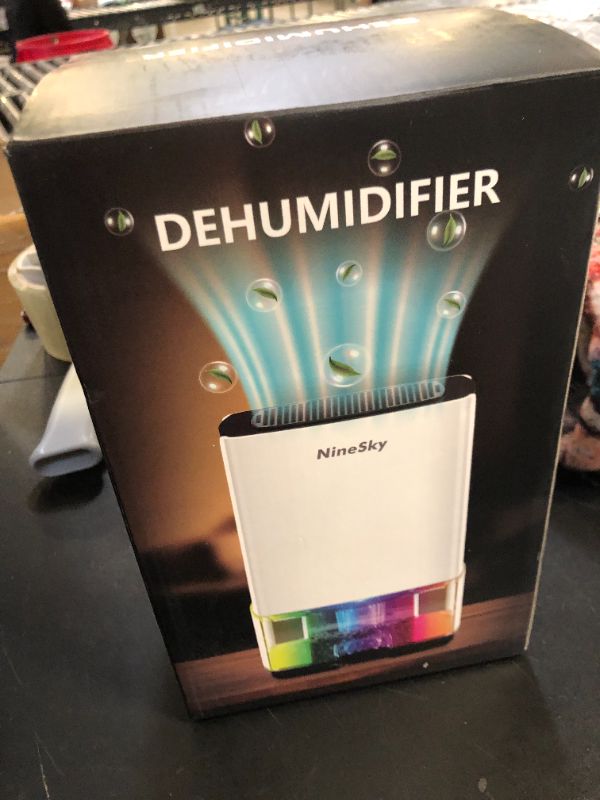 Photo 1 of NineSky Dehumidifier for Home, 35oz Water Tank (300 sq.ft), Small Dehumidifiers for Bathroom, Bedroom, Basement with 7 Colorful Lights, Auto Shut Off, White
