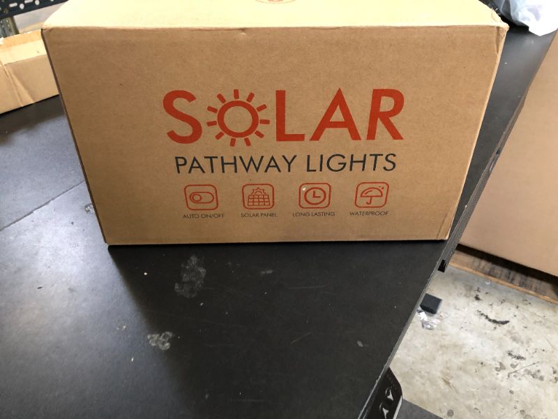 Photo 1 of NEWMESSI 8 Pack Bright Solar Pathway Lights, IP65 Waterproof Outdoor Garden Path Lights, Solar Powered for Yard, Lawn, Walkway, Driveway Landscape Lighting (Cool White)