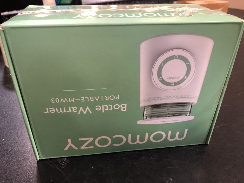 Photo 1 of Momcozy Portable Bottle Warmer for Travel, Double Leak-Proof Travel Bottle Warmer with Fast Heating, Safety Material Baby Bottle Warmer for Dr. Brown, Philips Avent, Medela, Tommee Tippee, Comotomo