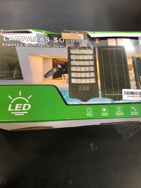 Photo 1 of JAYNLT Y-5200W Solar Street Lights Outdoor,520000LM 6500K Commercial Parking Lot Lights Dusk to Dawn, Waterproof Solar Security Flood Lamps with Motion Sensor and Remote for Yard, Garage, Driveway