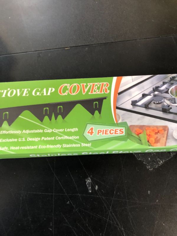 Photo 1 of Stove Gap Covers Stainless Steel 2 Packs, 13.8~27.6 Inch Adjustable Heat Resistant Not Sharp Gap Filler, Easy to Clear Stove Counter Gap Cover Suitable for Even Surface (Silver)