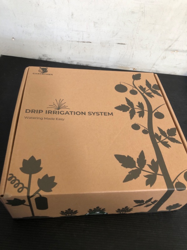 Photo 1 of CARPATHEN Drip Irrigation System - Adjustable Premium Irrigation System for Garden, Raised Beds - Complete Drip Irrigation Kit with Drip Emitters, 5/16" and 1/4" Irrigation Tubing and Barbed Fittings