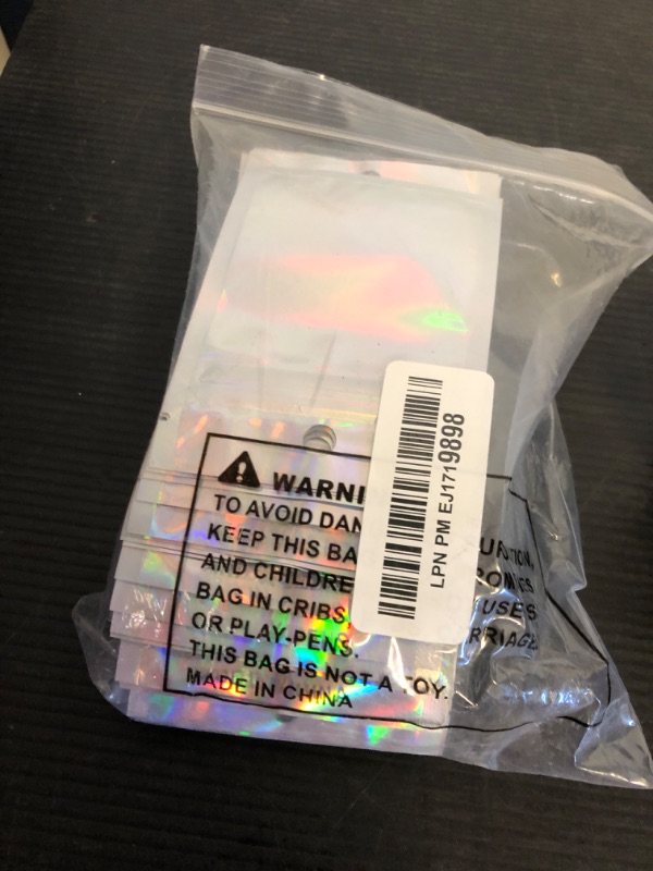 Photo 1 of EgticLive 100 Pack Resealable Holographic Bags for Small Business, Iridescent Mylar Bags with Clear Front Smell Proof Foil Packing Pouches for Multipurpose Storage (3 X 4 inches)
