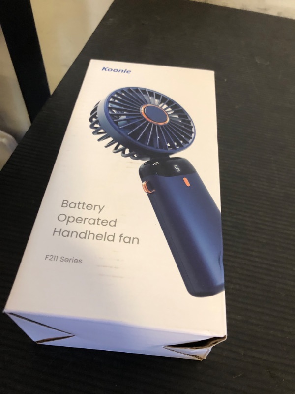 Photo 1 of Koonie Portable Handheld Fan, Battery Operated Fan with Base, 8 Hours, Digital Display, 5 Speeds, 90° Ajustable, Rechargeable Mini Fan for Outdoor Indoor