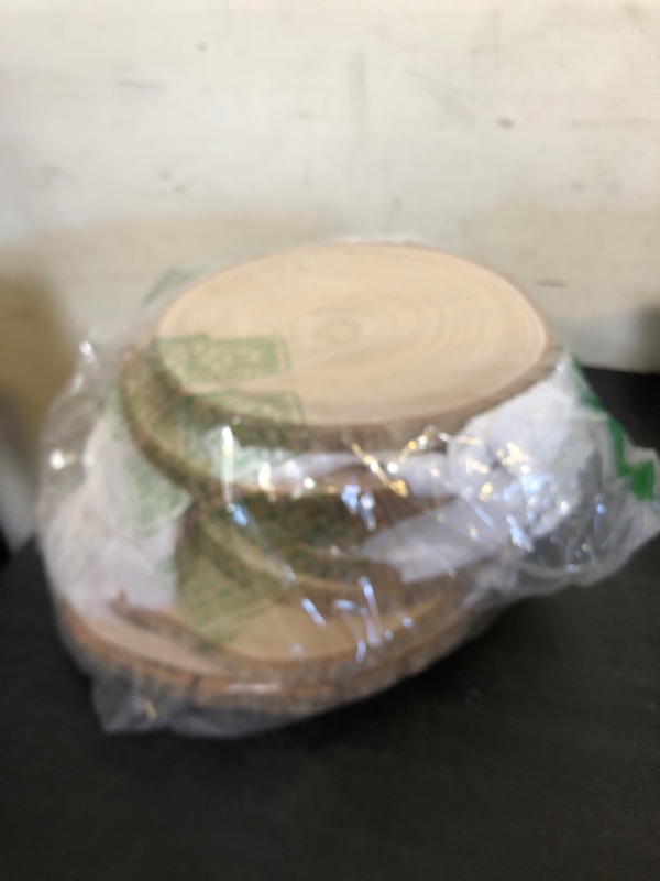 Photo 1 of KARAVELLA (10) Pack 10-11 inches Large Wood Slices for Centerpieces - Wood Centerpieces for Tables, Rustic Wedding Centerpiece, Natural Wood Slabs
