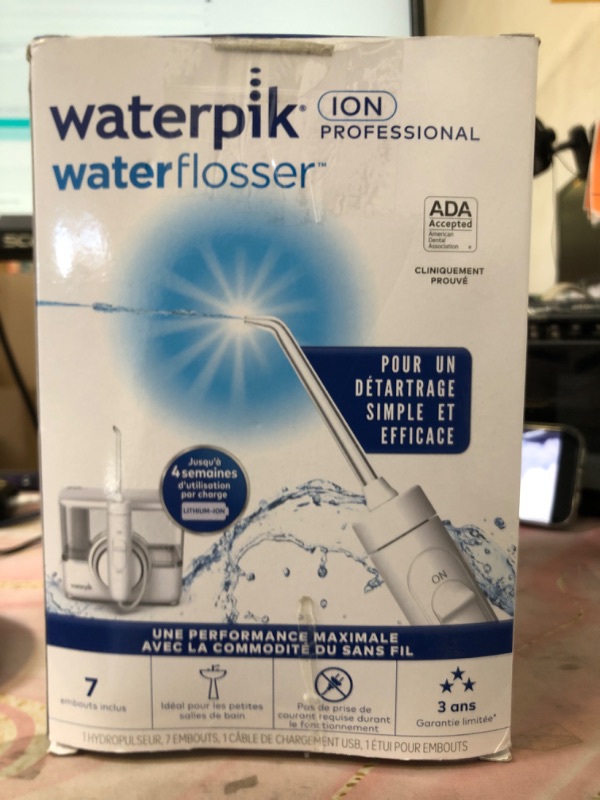 Photo 1 of Waterpik ION Professional Water Flosser, Rechargeable and Portable for Teeth, Gums, Braces, 10 Settings, 7 Flossing Tips For Multiple Users And Needs, ADA Accepted, WF-12 White, Packaging May Vary