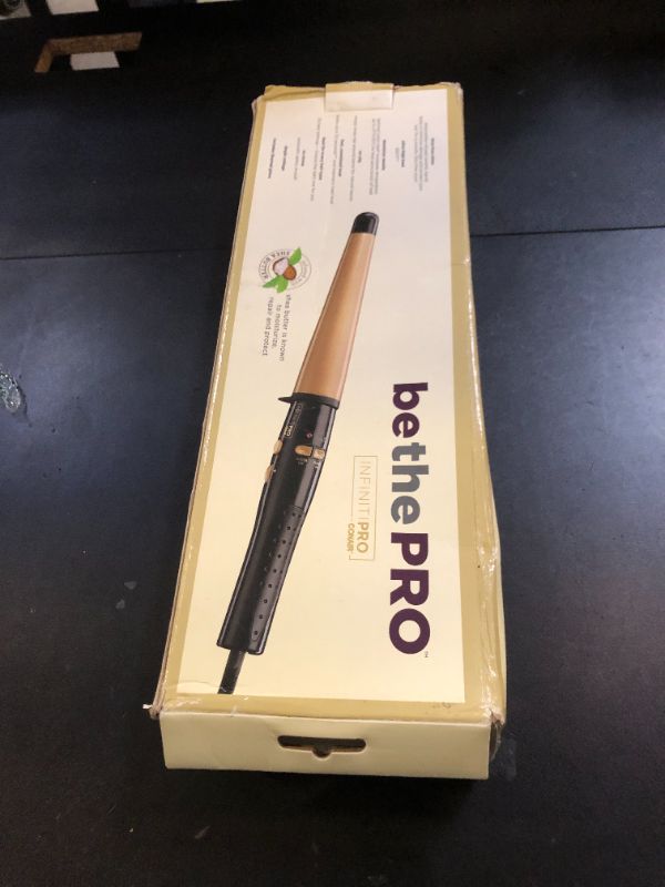 Photo 1 of INFINITIPRO by CONAIR Curl Secret Automatic Curling Iron - 1 1/4-inch Barrel - Hair Curler for All Hair Types and Medium to Long Hair Lengths - Dual Voltage for Worldwide Travel