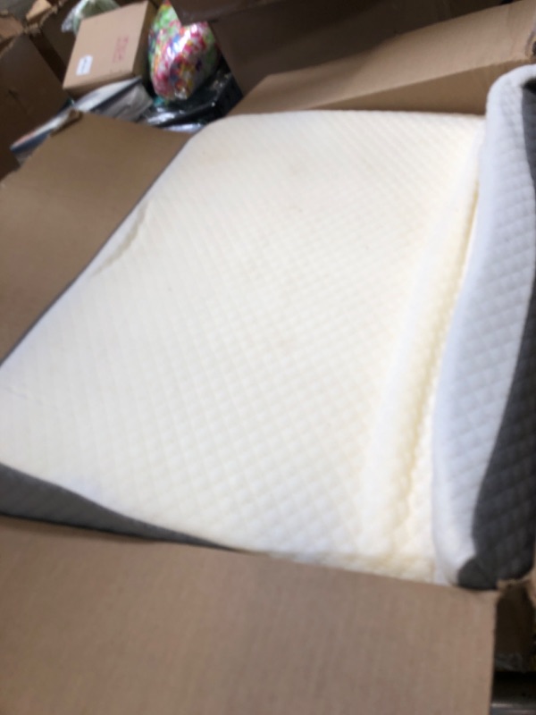 Photo 1 of angled pillow 