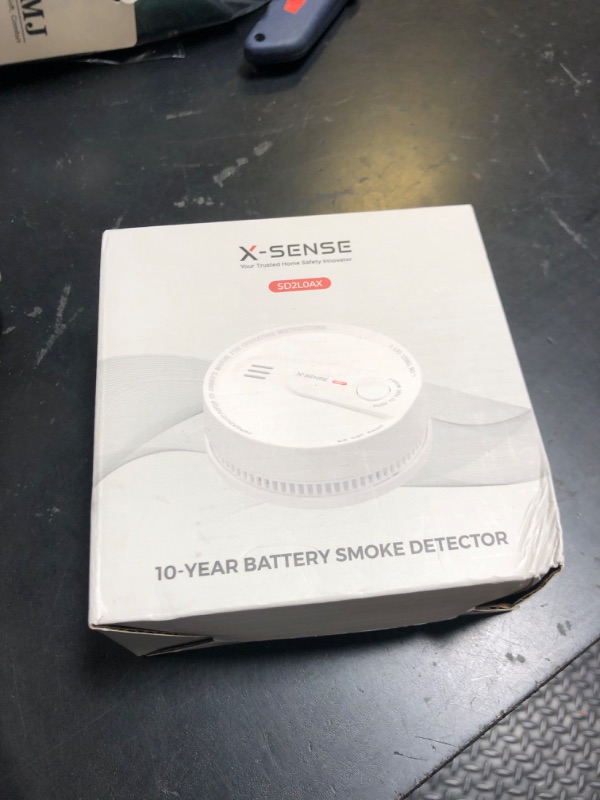 Photo 1 of X-Sense  Detector, 10-Year Battery Smoke Fire Alarm with Photoelectric Sensor, LED Indicator & Silence Button, 1-Pack