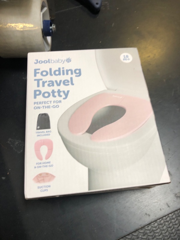 Photo 1 of Jool Baby Folding Travel Potty Training Seat for Toddlers, Fits Round & Oval Toilets, Non-Slip Suction Cups, Includes Free Travel Bag (Pink)