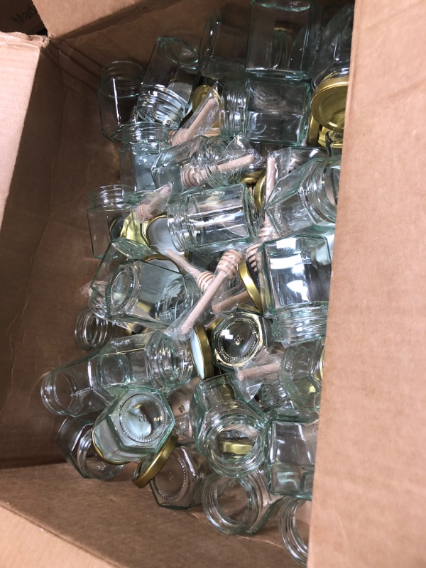 Photo 1 of BIGIVACA 3 oz Hexagon Mini Glass Honey Jars with Wood Dippers,48 Pack Small Honey Jars with Gold Lids,Bee Pendants,Jutes,Bee Stickers,Perfect for Baby Shower,Wedding Favors,Party Favors