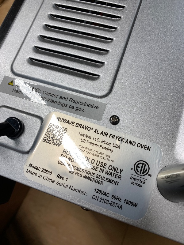 Photo 1 of (DENTED) (PARTS) (NON-FUNCTIONAL) Nuwave Bravo XL Air Fryer Toaster Smart Oven, 12-in-1 Countertop Grill/Griddle Combo, 30-Qt XL Capacity, 50F-500F adjustable in precise 5F increments, Integrated Smart Thermometer, Linear T Technology