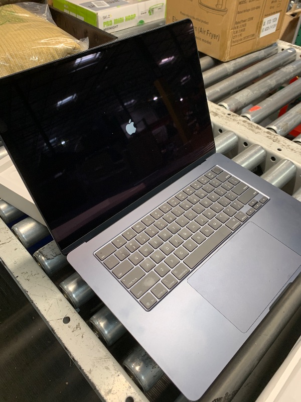 Photo 1 of Apple 2025 MacBook Air 15-inch Laptop with M4 chip: Built for Apple Intelligence, 15.3-inch Liquid Retina Display, 16GB Unified Memory, 512GB SSD Storage, 12MP Center Stage Camera, Touch ID; Midnight