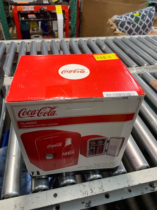 Photo 1 of (used) Coca-Cola Classic Coke Bottle 4L Mini Fridge w/ 12V DC and 110V AC Cords, 6 Can Portable Cooler, Personal Travel Refrigerator 