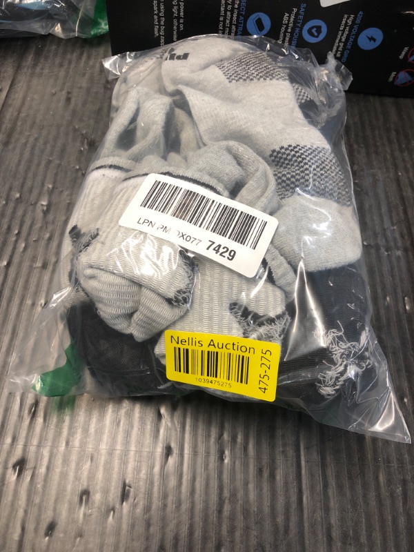 Photo 1 of ***(HEAVILY USED)***
PUMA mens 6 Pack Crew running socks, Black/Grey Combo, 13-15 US