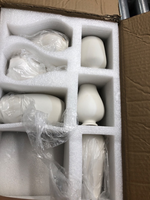 Photo 1 of **MISSING A FEW VASES**
Ceramic  Vase Set of 8, Small Vase for Flowers, White Mini Bud Vase in Bulk for Centerpieces, Rustic White Ceramic Vase Set for Flowers, Room Décor, Wedding Party