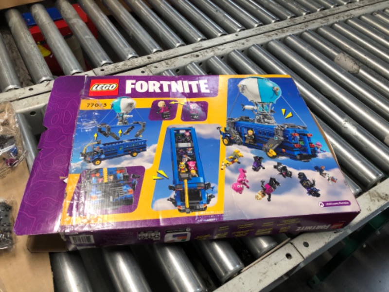 Photo 1 of (PARTS) (NOT A COMPLETE SET) (BOX IS CUT) LEGO Fortnite Battle Bus - Collectible Fortnite Toy for Kids, Boys and Girls, Ages 10+ - Pretend Play Set with 9 Minifigures from Video Game - Gift Ideas for Fans - 77073