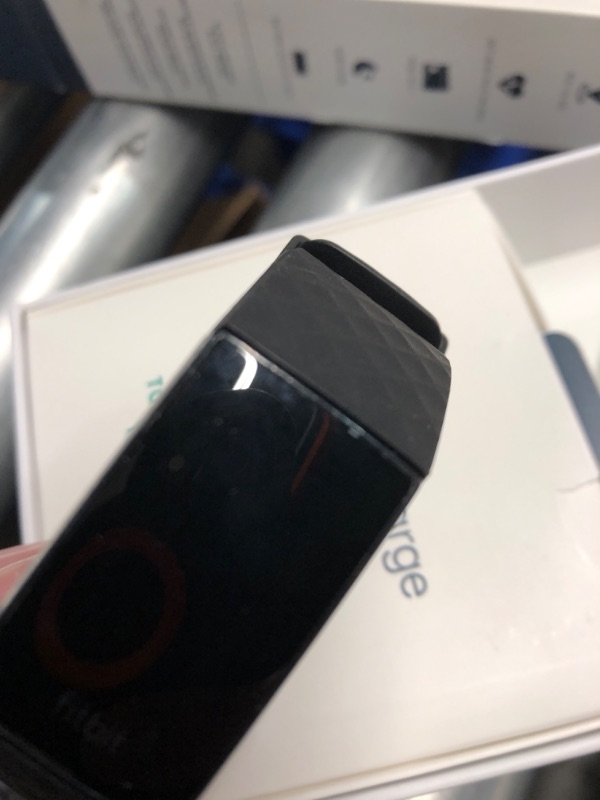 Photo 1 of (used)(see all images) Fitbit Charge 4 Black Advanced Fitness Tracker