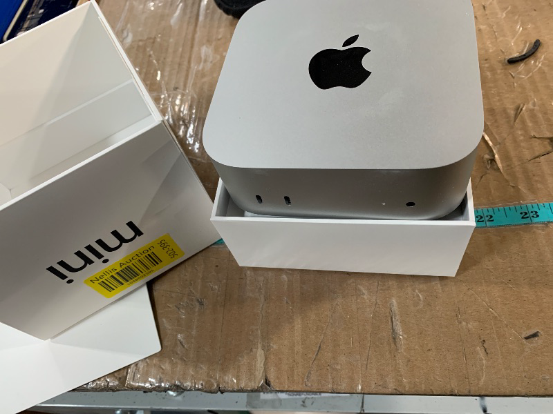 Photo 1 of **LOCKED TO PREVIOUS ACCOUNT**
Apple 2024 Mac mini Desktop Computer with M4 chip with 10?core CPU and 10?core GPU: Built for Apple Intelligence, 16GB Unified Memory, 256GB SSD Storage, Gigabit Ethernet. Works with iPhone/iPad
