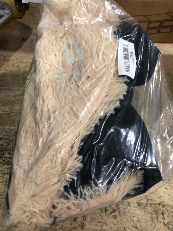 Photo 1 of Amazon Basics Donut Pet Bolster Faux Fur Bed for Dog, Beige, 23" x 23"